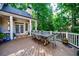Spacious outdoor deck featuring a large dining table and chairs, perfect for entertaining at 1412 Lanier Ne Mnr, Atlanta, GA 30319
