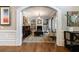 Cozy living room with fireplace, built-in bookshelves, and an archway entry at 1412 Lanier Ne Mnr, Atlanta, GA 30319