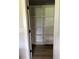 Walk-in closet with ample storage space, featuring adjustable shelves and laminate flooring at 1522 Reserve Glen Dr, Lawrenceville, GA 30043