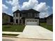Beautiful new construction home with a well manicured lawn and two car garage at 1522 Reserve Glen Dr, Lawrenceville, GA 30043