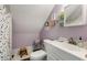 Cozy bathroom featuring a white vanity, patterned shower curtain, and neutral wall color at 7575 Hunters Woods W Dr, Atlanta, GA 30350
