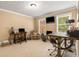 Bright and spacious office with multiple desks, comfortable seating, and natural light at 7575 Hunters Woods W Dr, Atlanta, GA 30350