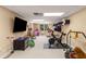Fun-filled playroom includes a TV, exercise equipment, and plenty of space for activities at 7575 Hunters Woods W Dr, Atlanta, GA 30350