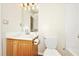 A well-lit bathroom features a toilet, shower-tub, and sink vanity at 1338 Gates Se Dr, Atlanta, GA 30316
