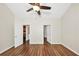 Spacious bedroom with wood floors and two doors leading to other rooms, offering convenience at 1338 Gates Se Dr, Atlanta, GA 30316