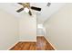 Bedroom with vaulted ceilings, ceiling fan, and wood-look flooring at 1338 Gates Se Dr, Atlanta, GA 30316