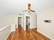Loft space with wood-look flooring, ceiling fan, and natural light at 1338 Gates Se Dr, Atlanta, GA 30316