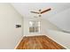 Loft space with wood-look flooring, ceiling fan, and natural light at 1338 Gates Se Dr, Atlanta, GA 30316