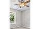 Cozy bedroom featuring neutral paint, plush carpeting, and modern ceiling fan at 35 Ravenwood Dr, Rockmart, GA 30153