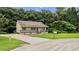 Charming home with a welcoming front porch, driveway, and landscaped front yard at 35 Ravenwood Dr, Rockmart, GA 30153