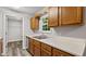 Traditional kitchen with stainless steel dishwasher, double sinks and wood cabinets at 35 Ravenwood Dr, Rockmart, GA 30153