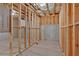Unfinished basement with concrete floor and exposed beams ready to be finished at 7449 Waterview Cv, Douglasville, GA 30135