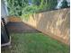 Fenced backyard with lawn and mulched garden, perfect for outdoor enjoyment at 1090 Coleman Sw St, Atlanta, GA 30310