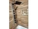 Modern bathroom featuring a custom shower panel with rainfall and body spray options and wood-look tile surround at 1090 Coleman Sw St, Atlanta, GA 30310