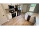 Modern kitchen with stainless steel appliances, white cabinets, solid surface counter tops, and an integrated wine cooler at 1090 Coleman Sw St, Atlanta, GA 30310