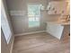 Bright, eat-in kitchen with solid counter tops, smart home features, and a stylish chandelier at 1090 Coleman Sw St, Atlanta, GA 30310