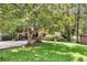 Charming single-story home with a covered carport and beautiful mature trees at 2991 Monterey Drive Dr, Decatur, GA 30032