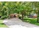 Inviting single-story home featuring a covered carport and a well-maintained yard at 2991 Monterey Drive Dr, Decatur, GA 30032