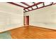 Spacious living room with hardwood floors and exposed beam ceiling at 2991 Monterey Drive Dr, Decatur, GA 30032