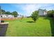 Expansive backyard with a verdant lawn, perfect for outdoor activities and relaxation at 4776 Harrod Ct, Douglasville, GA 30135