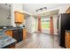 Bright kitchen with modern appliances, stylish cabinets, and a view to the backyard at 4776 Harrod Ct, Douglasville, GA 30135