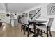 Eat-in kitchen and dining area with hardwood floors and pendant lighting at 611 Sugar Prairie Bnd, Lawrenceville, GA 30045