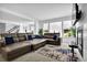 Bright living room featuring a fireplace and a sectional sofa at 611 Sugar Prairie Bnd, Lawrenceville, GA 30045