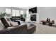 Comfortable living room featuring a fireplace and a sectional sofa at 611 Sugar Prairie Bnd, Lawrenceville, GA 30045