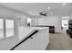 Bright upstairs loft area with neutral carpet, windows, and cozy seating area at 611 Sugar Prairie Bnd, Lawrenceville, GA 30045