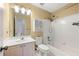 Full bathroom featuring a bathtub, shower, and vanity with white cabinetry at 1095 Northpoint Trce, Roswell, GA 30076