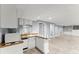 View of the basement refreshment area with a microwave and dishwasher at 15 Vickwood Court Ne, Marietta, GA 30068