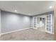 Basement space with French doors leading to another room at 15 Vickwood Court Ne, Marietta, GA 30068