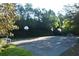 Outdoor basketball court with lush green surroundings and a soccer goal, perfect for recreation at 15 Vickwood Court Ne, Marietta, GA 30068