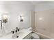 Clean bathroom featuring a single sink vanity and shower-tub combination at 15 Vickwood Court Ne, Marietta, GA 30068