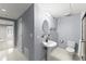 Bathroom featuring white tile floors and a vintage style pedestal sink at 15 Vickwood Court Ne, Marietta, GA 30068