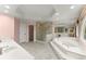 Luxurious bathroom with a garden tub, walk-in shower, and double sink vanity for a spa-like experience at 15 Vickwood Court Ne, Marietta, GA 30068