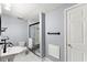 Bathroom featuring a sleek glass shower and unique pedestal sink at 15 Vickwood Court Ne, Marietta, GA 30068
