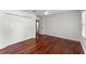 Spacious bedroom featuring hardwood floors, ceiling fan and a large closet at 15 Vickwood Court Ne, Marietta, GA 30068
