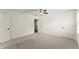 Large bedroom with neutral walls, plush carpet, and multiple entryways at 15 Vickwood Court Ne, Marietta, GA 30068