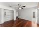 Bedroom featuring hardwood floors, a ceiling fan and closet at 15 Vickwood Court Ne, Marietta, GA 30068