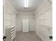 Walk-in closet featuring organized shelving, a four drawer cabinet, and ample storage space at 15 Vickwood Court Ne, Marietta, GA 30068