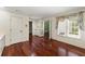 Dining room featuring hardwood floors and a window with patterned valance at 15 Vickwood Court Ne, Marietta, GA 30068