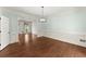 Spacious dining room with hardwood floors, wainscoting, and open doorway at 15 Vickwood Court Ne, Marietta, GA 30068