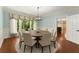Elegant dining room with a round table, seating for eight, and classic décor at 15 Vickwood Court Ne, Marietta, GA 30068