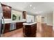 Well-lit kitchen boasts stainless steel appliances, a center island, and open layout at 15 Vickwood Court Ne, Marietta, GA 30068