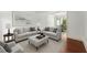 Cozy living room with neutral decor, hardwood floors, and comfortable seating at 15 Vickwood Court Ne, Marietta, GA 30068
