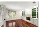 Living room with hardwood floors, a fireplace and custom built-ins at 15 Vickwood Court Ne, Marietta, GA 30068