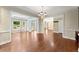 Inviting sunroom features large windows offering beautiful views of the outdoors at 15 Vickwood Court Ne, Marietta, GA 30068