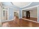 Light-filled sunroom with access to a deck, hardwood floors, and a vaulted ceiling at 15 Vickwood Court Ne, Marietta, GA 30068