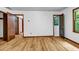 Bedroom featuring hardwood floors, window, neutral paint, and closets at 2775 Doaks Run Ct, Tucker, GA 30084